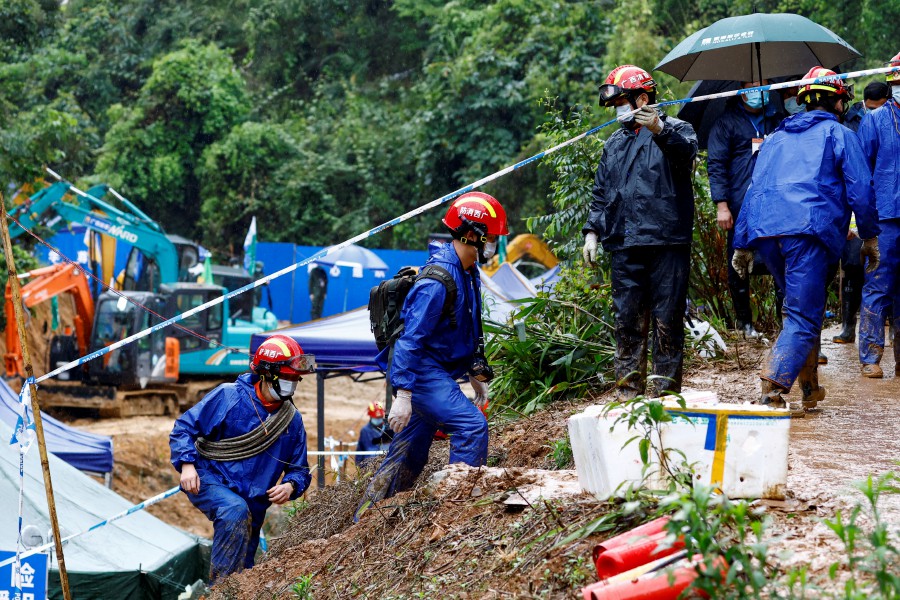 Rescue workers work at the site where a China Eastern Airlines Boeing 737-800 plane flying from Kunming to Guangzhou crashed, in Wuzhou, Guangxi Zhuang Autonomous Region, China March 24, 2022. -REUTERS file pic