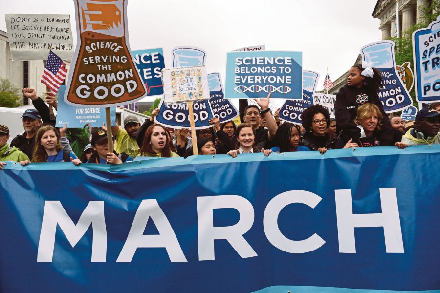 People participating in the March for Science in Washington on Saturday. Scientists the world over have come out in full force to voice concerns over what is now developing into global politics which they claim does not augur well for the future. AP Photo 