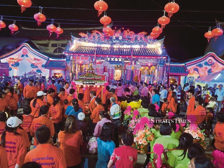 Devotees making a beeline for the Lim Ko Niao Temple during the festival. 