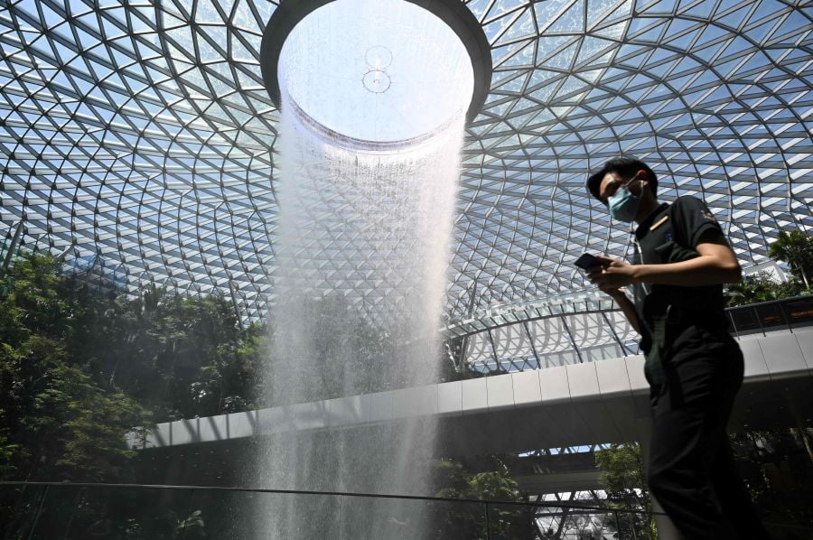 Changi Airport said all foreign visitors arriving in Singapore, regardless of their nationality, can now use the automated immigration clearance lanes. - AFP PIC