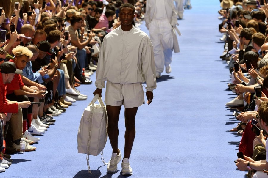 Brands from Vuitton to Balenciaga courting male shoppers
