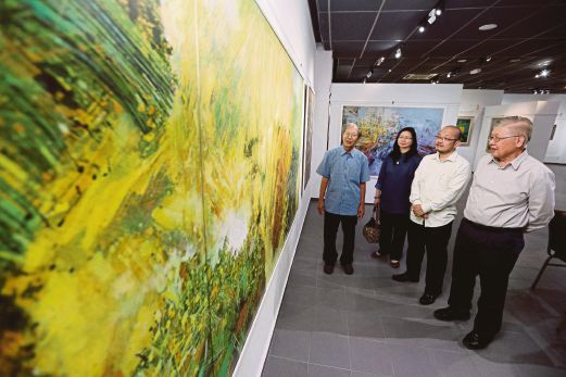 Artist Cheung Pooi Yip (left) at Balai Seni Lukis Negeri Pulau Pinang. Pic by Muhammad Mikail Ong