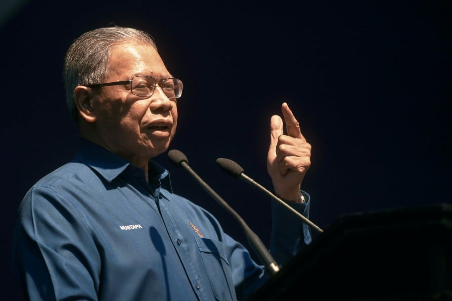 Datuk Seri Mustapa Mohamed today dismissed reports of him being fielded as a candidate in the 15th General Election (GE15). FILE PIC