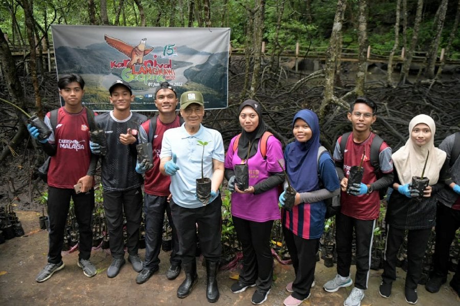 A tour of the mangrove ecosystem at Kilim Karst Geoforest Park is one of several educational activities visitors can enjoy. - File pic credit (Langkawi Geopark)