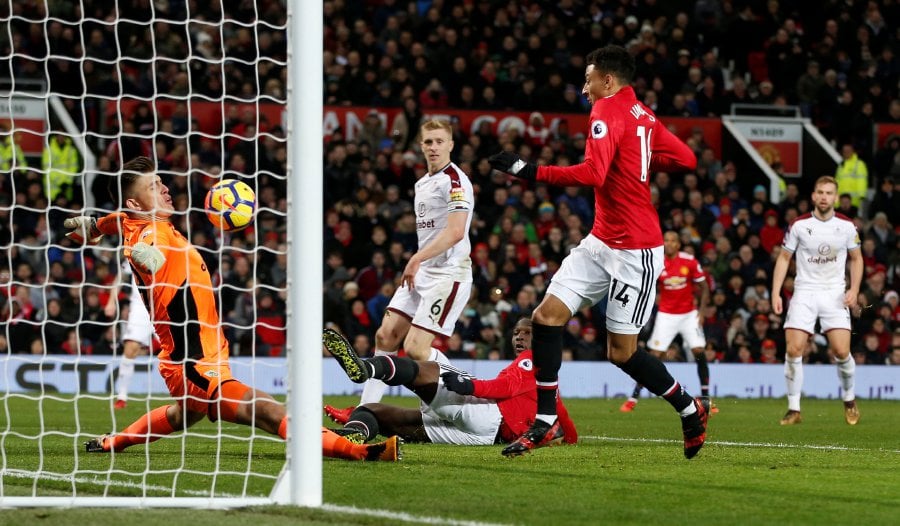 Lingard double helps United earn comeback draw with Burnley | New ...