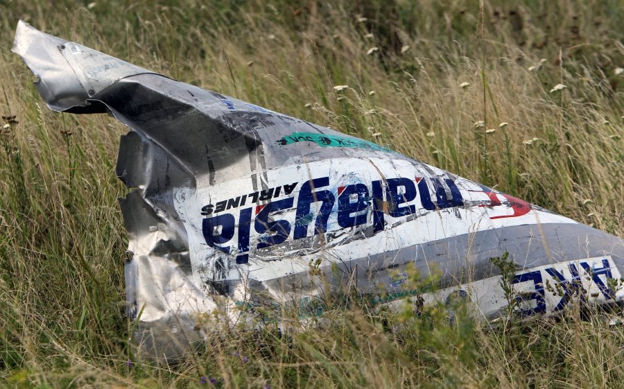  Part of the wreckage at the main crash site of the Boeing 777 Malaysia Airlines flight MH17, which crashed over the eastern Ukraine region, near Grabovo, some 100 km east of Donetsk, Ukraine, 20 July 2014 (reissued 25 May 2018). Australia and The Netherlands on 25 May 2018, have formally accused Russia of being responsible for the downing of Malaysia Airlines' Boeing 777 plane flight MH17, en route from Amsterdam to Kuala Lumpur, over eastern Ukraine in July 2014, resulting in the death of 298 people. EPA-EFE 