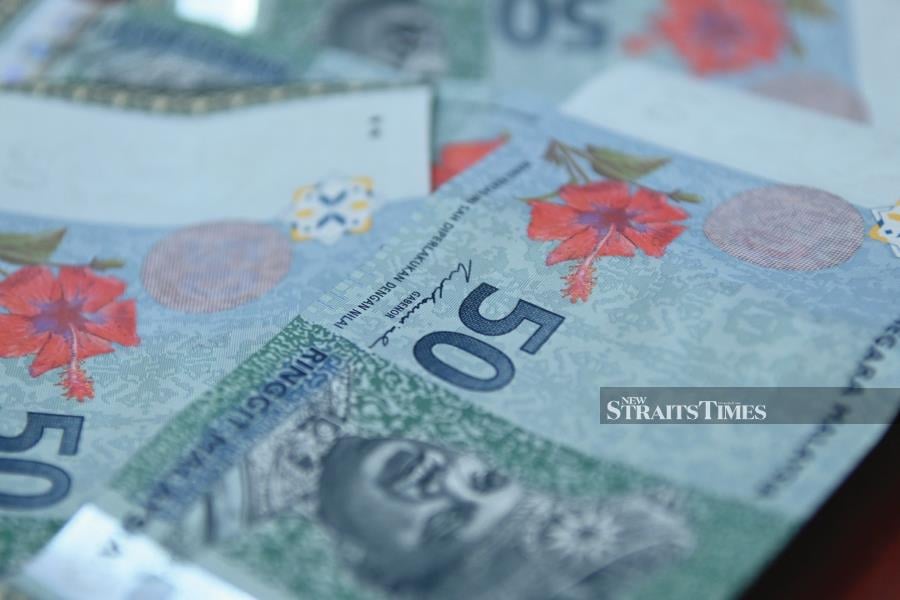 A closeup shot of Malaysian Riggit bills