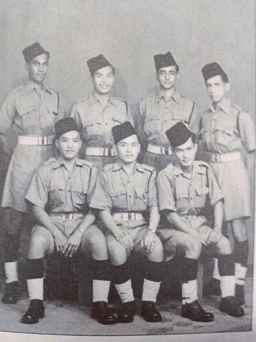 Tan Sri John Joe Raj Jr (standing, left) with seven of the first batch of 10 probationary police inspectors in 1947. 