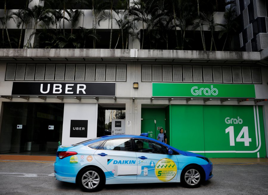 Singapore Uber workers told to pack, leave HQ within two ...