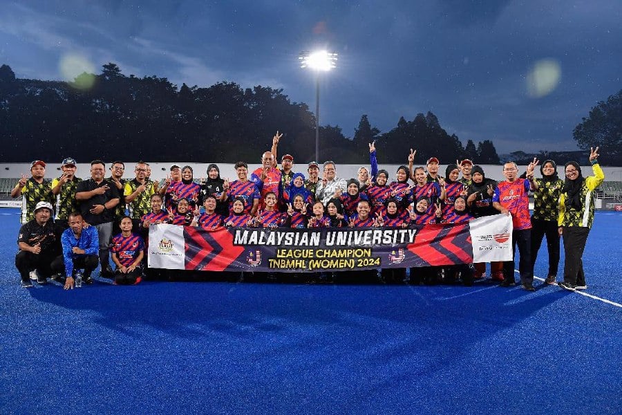 The Malaysian University team celebrating after winning the women's Malaysia Hockey League title at National Hockey Stadium in Bukit Jalil today.