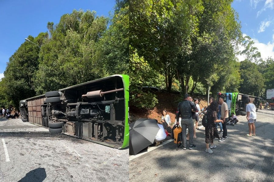 Two Chinese nationals were killed, and several others were injured after a tour bus landed on its side while travelling downhill at Km16.5 of Jalan Genting-Bentong last Saturday. COURTESY PIC