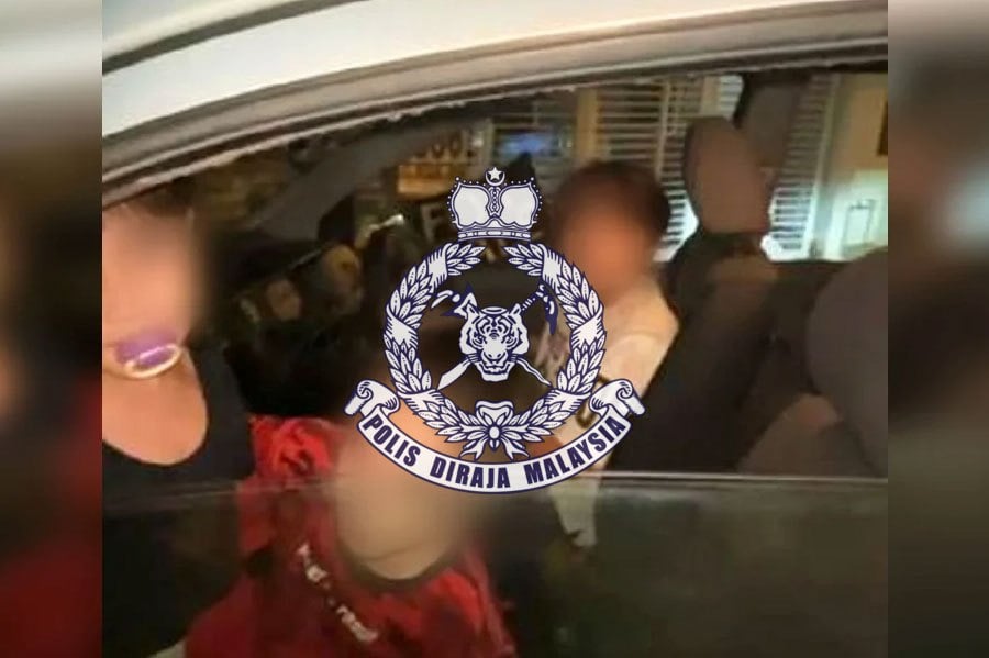 Police are tracking down the parents of three underage siblings seen in a car which one of them was driving, after a video of them went viral on social media and messaging apps. PIC SCREEN GRAB FROM SOCMED VIDEO