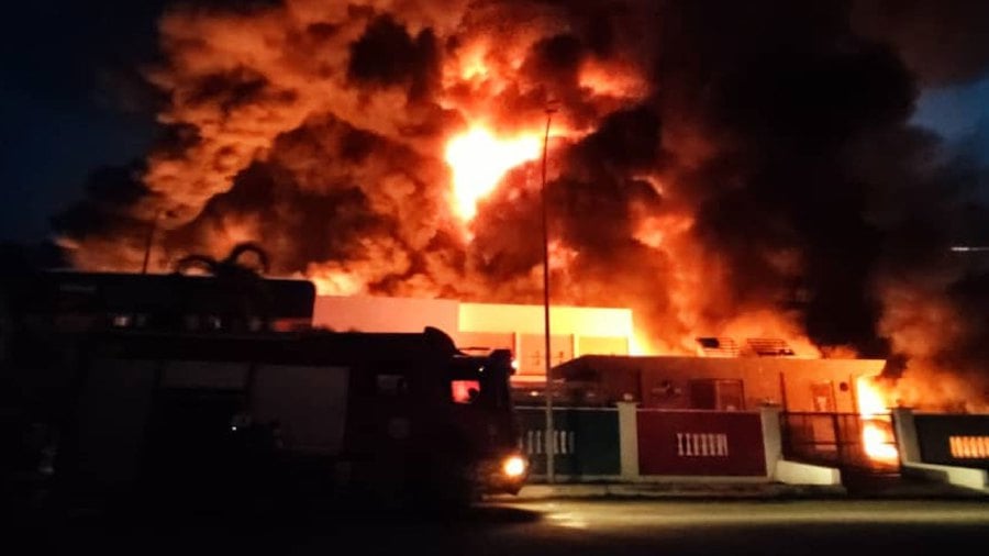 The fire which destroyed two paint factories in the Meru Industrial Park on Monday. File pic courtesy of the Fire and Rescue Department