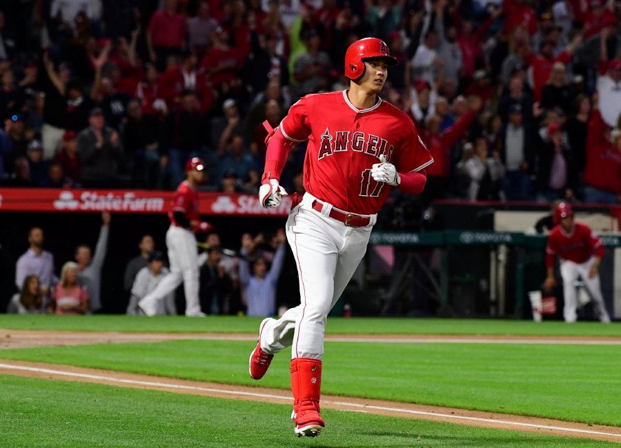 Ohtani hits homer, leaves game with sprained ankle | New Straits Times ...