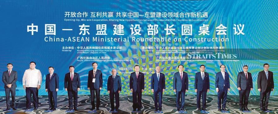 Housing and Local Government Minister Nga Kor Ming (third from left) and representatives from other countries at last year’s Asean-China Ministerial Roundtable on Construction and Housing (ACMROCH) in Nanning, China. PIC COURTESY OF HOUSING AND LOCAL GOVERNMENT MINISTRY 