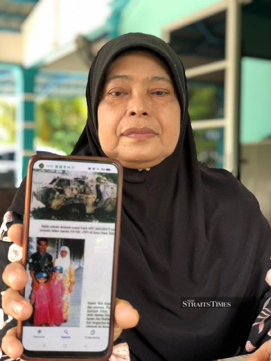 The widow of Corporal Mat Aznan Awang of the Malaysian peacekeeping force (Malbatt 1), Siti Zauyah Yahya sharing her husband’s armoured personnel carriers (APC) which was shot by a rocket-propelled grenade (RPG) by rebel forces. -NSTP/NOORAZURA ABDUL RAHMAN