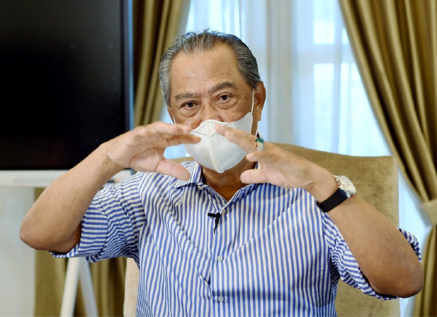 Prime Minister Tan Sri Muhyiddin Yassin during a special interview with senior news editors at his house on Friday. - Pic courtesy of PMO
