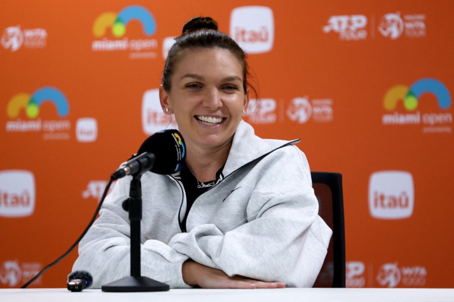  Simona Halep of Romania speaks to the media after a 6-1, 4-6, 3-6 loss to Paula Bados at the Miami Open at Hard Rock Stadium in Miami Gardens, Florida. -AFP PIC