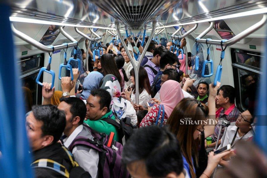 A file pic showing commuters on board an MRT train in Kuala Lumpur.  - NSTP file pic