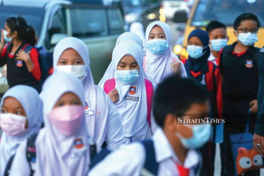 The SOP involved encouraging the use of face masks for teachers and students, in addition to school staff having to do self-tests if they have symptoms and always maintaining personal hygiene. - NSTP file pic