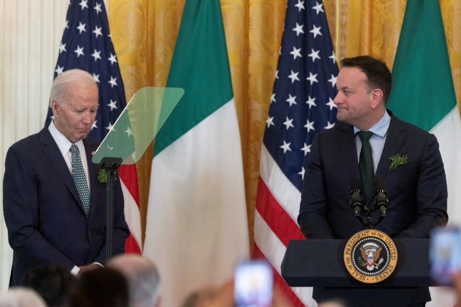 U.S. President Joe Biden reacts as Ireland's Taoiseach Leo Varadkar speaks about President Biden’s late son, Beau Biden, during a St. Patrick’s Day celebration event inside the East Room at the White House in Washington. - AFP PIC