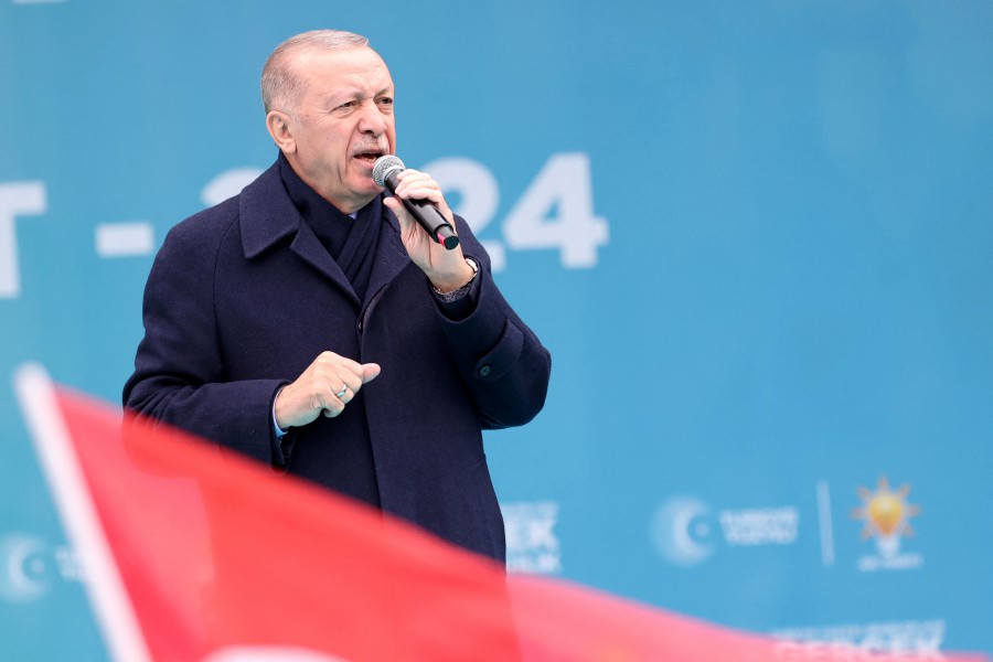 Turkish President and leader of Justice and Development (AK) Party, Recep Tayyip Erdogan, addresses supporters during an election campaign rally in Ankara. - AFP PIC