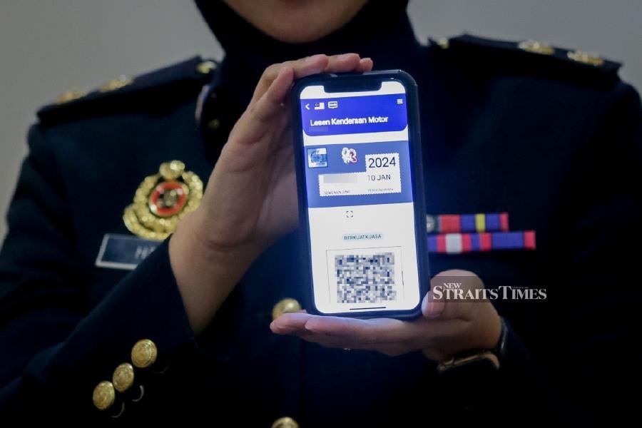 Renewal of driving licence and road tax can be done via the Road Transport Department's (RTD) MyJPJ app. The facility is only for Malaysians. - NSTP file pic
