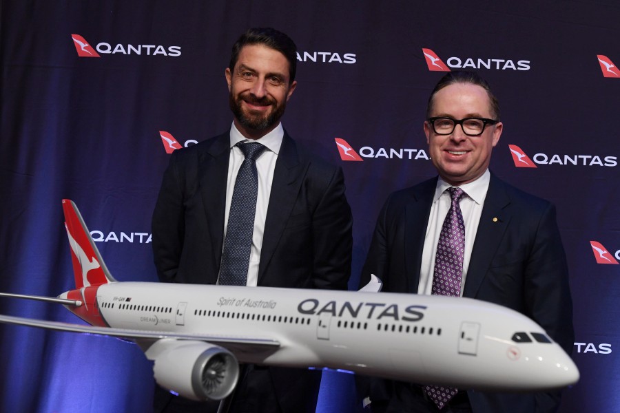 QANTAS Group CEO Alan Joyce (R) and CFO Tino La Spina (L) speak to the media as QANTAS Group delivers their full year results in Sydney, Australia, 22 August 2019. According to media reports, QANTAS posted a 6.5 percent fall in profits, sighting an increase in the cost of oil as the primary reason for the shortfall. (EPA/DEAN LEWINS) 