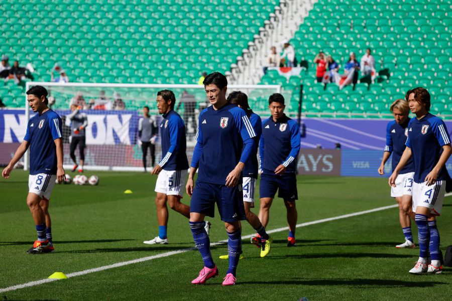 Japan's players warm up before the start of the Qatar 2023 AFC Asian Cup Group D football match between Japan and Vietnam at the Al-Thumama Stadium in Doha on January 14, 2024. - AFP PIC