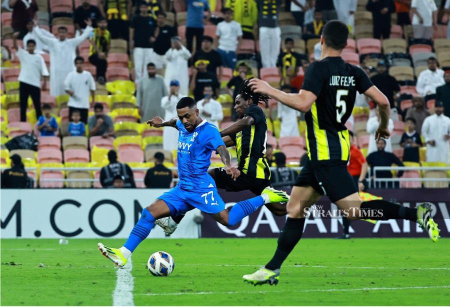 Al Hilal's Malcom scores their second goal against Al Ittihad at King Abdullah Sports City, Jeddah, Saudi Arabia. - REUTERS PIC