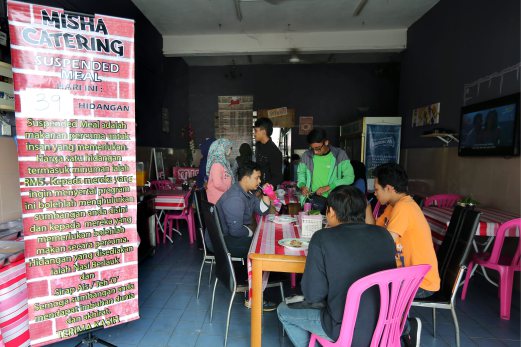 Misha Catering, a restaurant in Medan Tok Sira, Kuantan offers suspended meals to those who can’t afford a meal. The concept of suspended meal started in Italy where people bought extra coffee to be claimed by those who cannot afford one. Pic by Zulkepli Osman