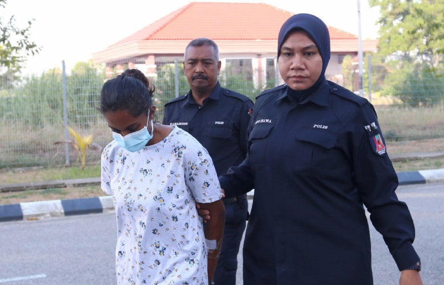 KOTA BARU : University student R. Keertana Naidu was charged at the Sessions Court here yesterday (May 9) for causing serious injury to her friend by splashing sulphuric acid on May 3. — STR/NIK ABDULLAH NIK OMAR