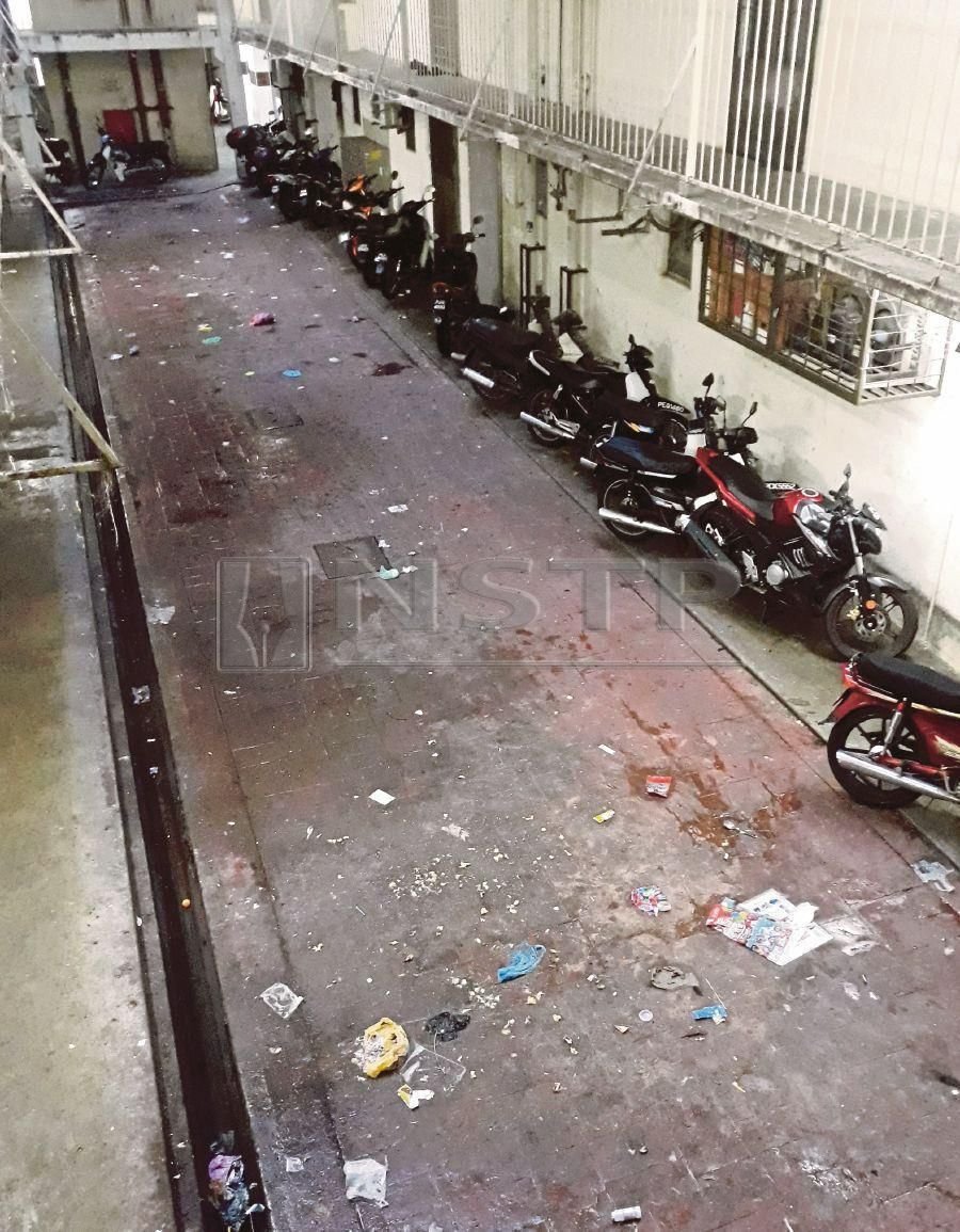 Rubbish splattered on the ground floor of Block J of the Padang Tembak People’s Housing Project in George Town.