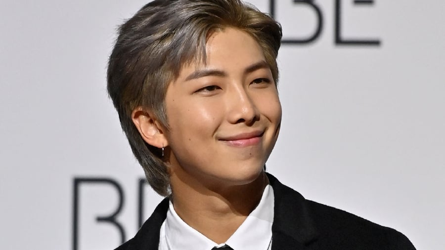 South Korean K-pop boy band BTS member RM poses for a photo session during a press conference on BTS new album 'BE (Deluxe Edition)' in Seoul. (Photo by Jung Yeon-je / AFP)