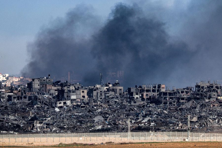 This picture taken on January 3, 2024 shows a view of buildings destroyed by Israeli bombardment in the central Gaza Strip. - AFP pic