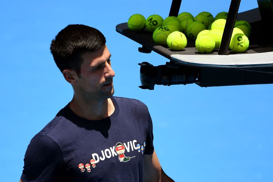 Novak Djokovic of Serbia takes a break during a practice session ahead of the Australian Open at the Melbourne Park tennis centre in Melbourne. - AFP Pic