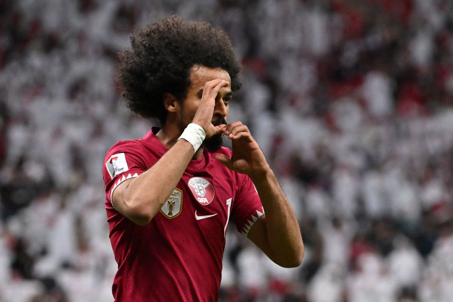 Qatar's forward #11 Akram Afif celebrates after scoring his team's first goal during the Qatar 2023 AFC Asian Cup Group A football match between Tajikistan and Qatar on January 17, 2024.- AFP pic