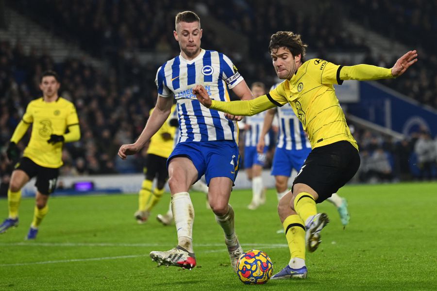 Chelsea's Spanish defender Marcos Alonso (R) vies with Brighton's English defender Adam Webster (C) during the English Premier League football match between Brighton and Hove Albion and Chelsea at the American Express Community Stadium in Brighton, southern England. - AFP Pic