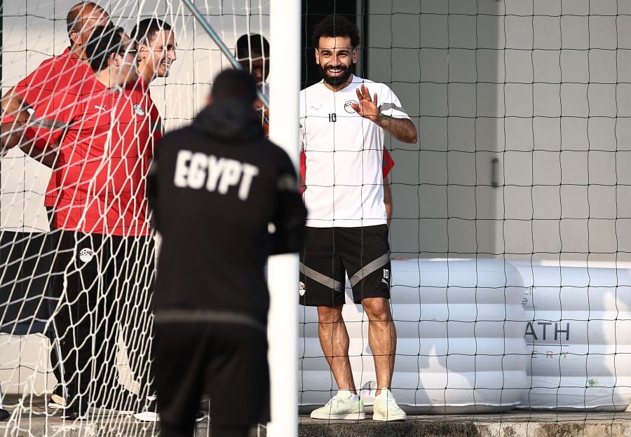 Egypt's forward #10 Mohamed Salah jokes during a training session at Jardin Botanique stadium in Bingerville, Abidjan on January 21, 2024 on the eve of the Africa Cup of Nations (CAN) 2024 football match between Egypt and Cape Verde. - AFP pic
