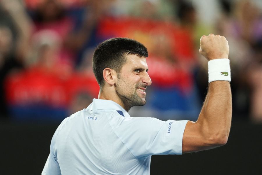 Serbia's Novak Djokovic celebrates after victory against France's Adrian Mannarino during their men's singles match on day eight of the Australian Open tennis tournament in Melbourne on January 21, 2024. - AFP pic
