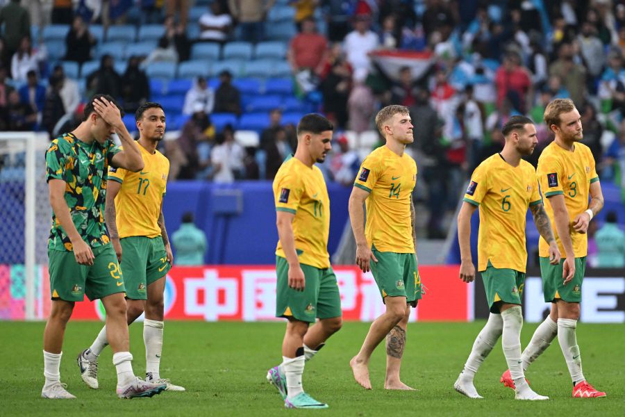 Australia's players leave the pitch after the Qatar 2023 AFC Asian Cup Group B football match between Australia and Uzbekistan at the Al-Janoub Stadium in Al-Wakrah, south of Doha on January 23, 2024. - AFP pic