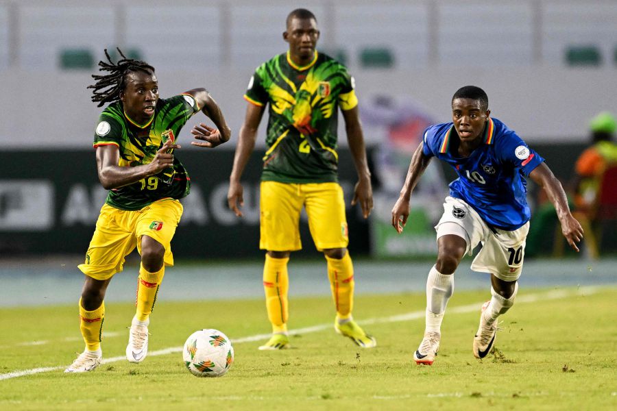 Mali's forward #19 Fousseni Diabate (L) fights for the ball with Namibia's midfielder #10 Prins Tjiueza (R) during the Africa Cup of Nations (CAN) 2024 group E football match between Namibia and Mali on January 24, 2024.- AFP pic