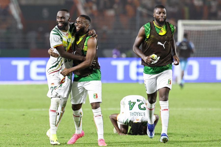 Mali's players celebrate after the victory at the end of the Africa Cup of Nations (CAN) 2024 round of 16 football match between Mali and Burkina Faso on January 30, 2024. - AFP pic