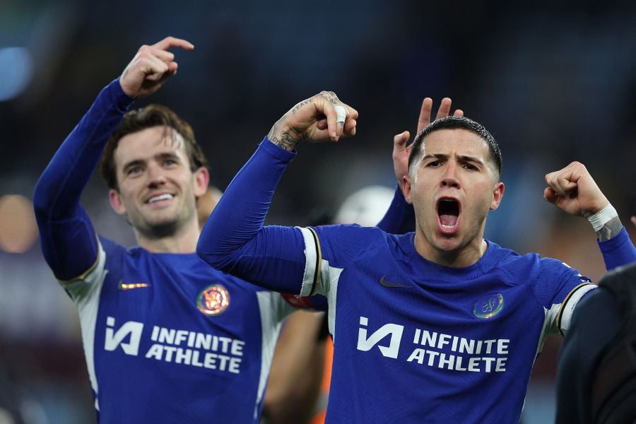 Chelsea's English defender #21 Ben Chilwell (L) and Chelsea's Argentinian midfielder #08 Enzo Fernandez celebrate after the English FA Cup fourth round replay football match between Aston Villa and Chelsea on February 7, 2024. Chelsea won the match 3-1. - AFP pic