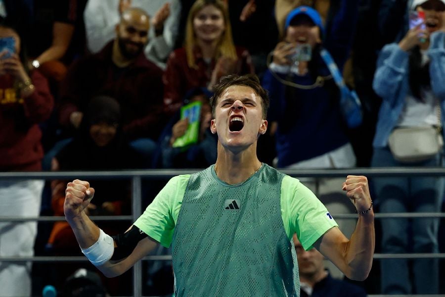 Czech Republic's Jakub Mensik celebrates after winning the men's singles match against Britain's Andy Murray at the ATP Qatar Open tennis tournament in Doha on February 21, 2024. - AFP pic