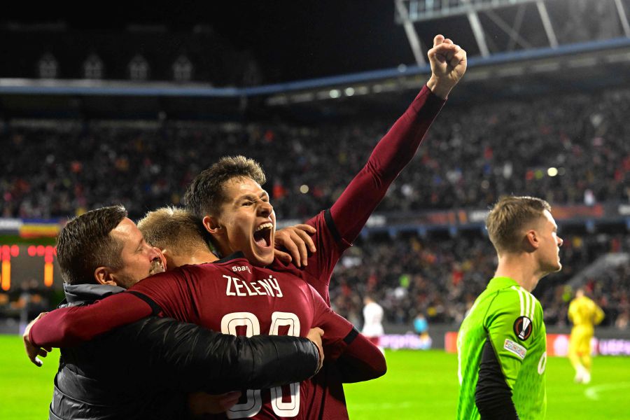 Sparta Praha's Czech defender #41 Martin Vitik and Sparta Praha's Czech defender #30 Jaroslav Zeleny celebrate during the UEFA Europa league knockout round play-off second leg football match between AC Sparta Praha (Prague) and Galatasaray SK. - AFP pic