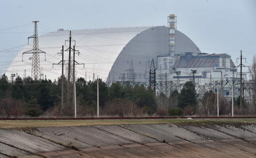 A file picture taken on April 13, 2021 shows the giant protective dome built over the sarcophagus covering the destroyed fourth reactor of the Chernobyl Nuclear Power Plant. - AFP Pic