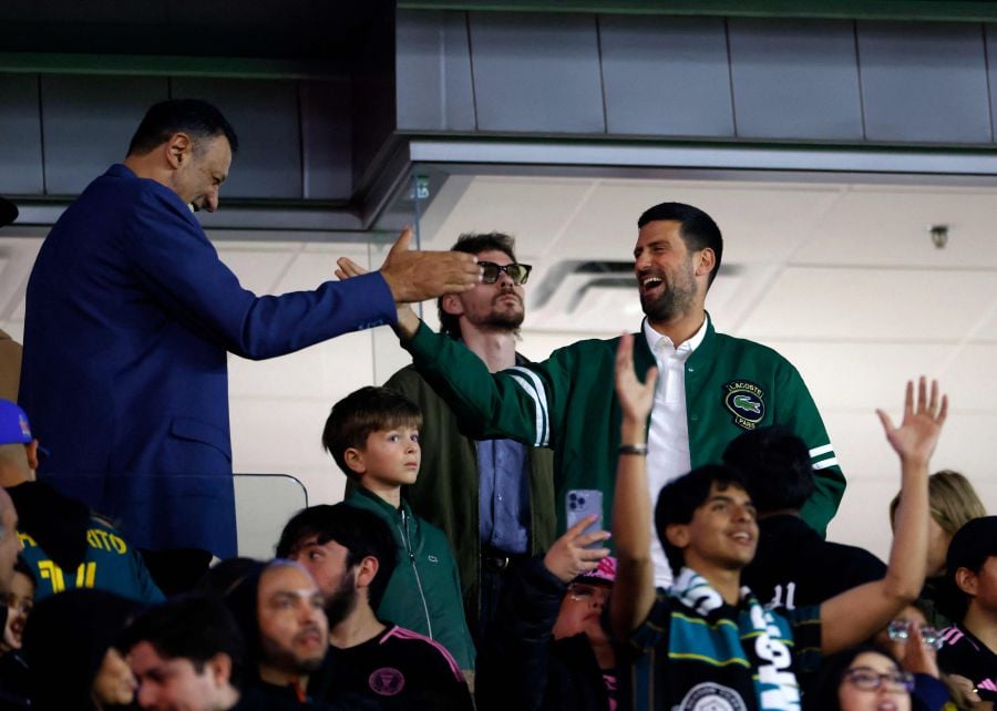 Tennis player Novak Djokovic and former NBA player Vlade Divac celebrate a goal by Dejan Joveljic of the Los Angeles Galaxy during the second half against Inter Miami at Dignity Health Sports Park on February 25, 2024 in Carson, California. - AFP pic