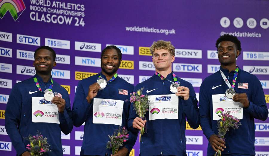 Silver medallist USA's team Christopher Bailey, Noah Lyles, Matthew Boling and Jacory Patterson celebrate on the podium after competing in the Men's 4x400m relay final during the Indoor World Athletics Championships in Glasgow, Scotland, on March 3, 2024.- AFP pic
