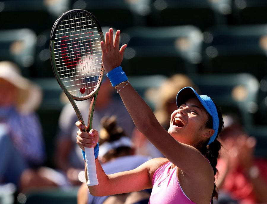 Emma Raducanu of Great Britain celebrates to the crowd after her straight sets victory against Rebeka Masarova of Spain in their first round match at Indian Wells Tennis Garden on March 07, 2024. - AFP pic